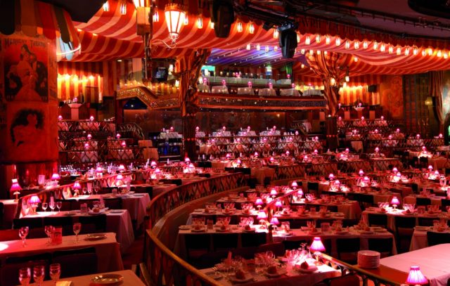 IMAGE: View of the seats and tables at the Moulin Rouge 