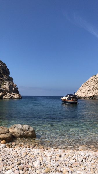 IMAGE: Tiny little cover with boat in Ibiza