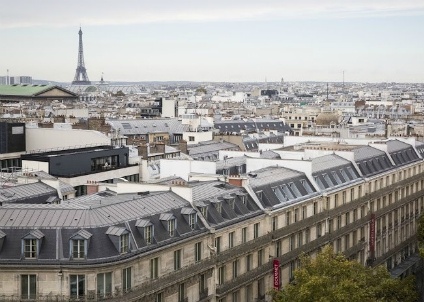 IMAGE: Panoramic view of Paris, including the Eiffel Tower, which can increase the value of a property significantly