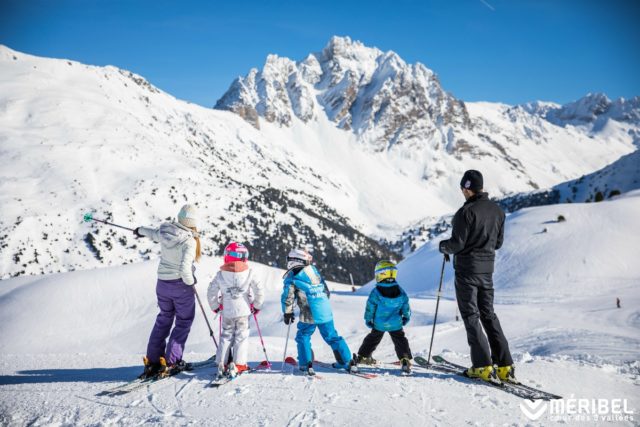 Family of skiers on the slopes at Méribel